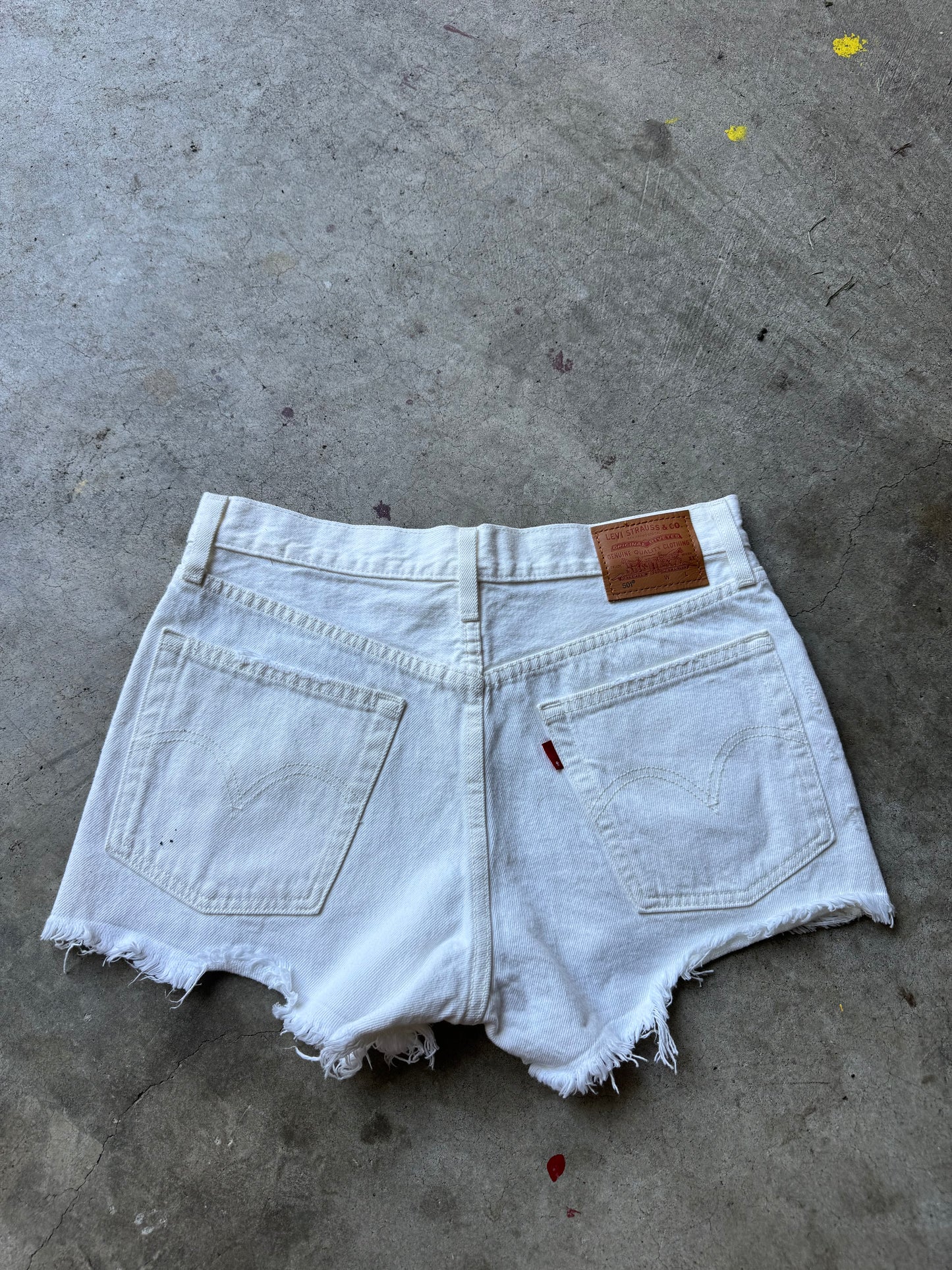 White Levi’s shorts