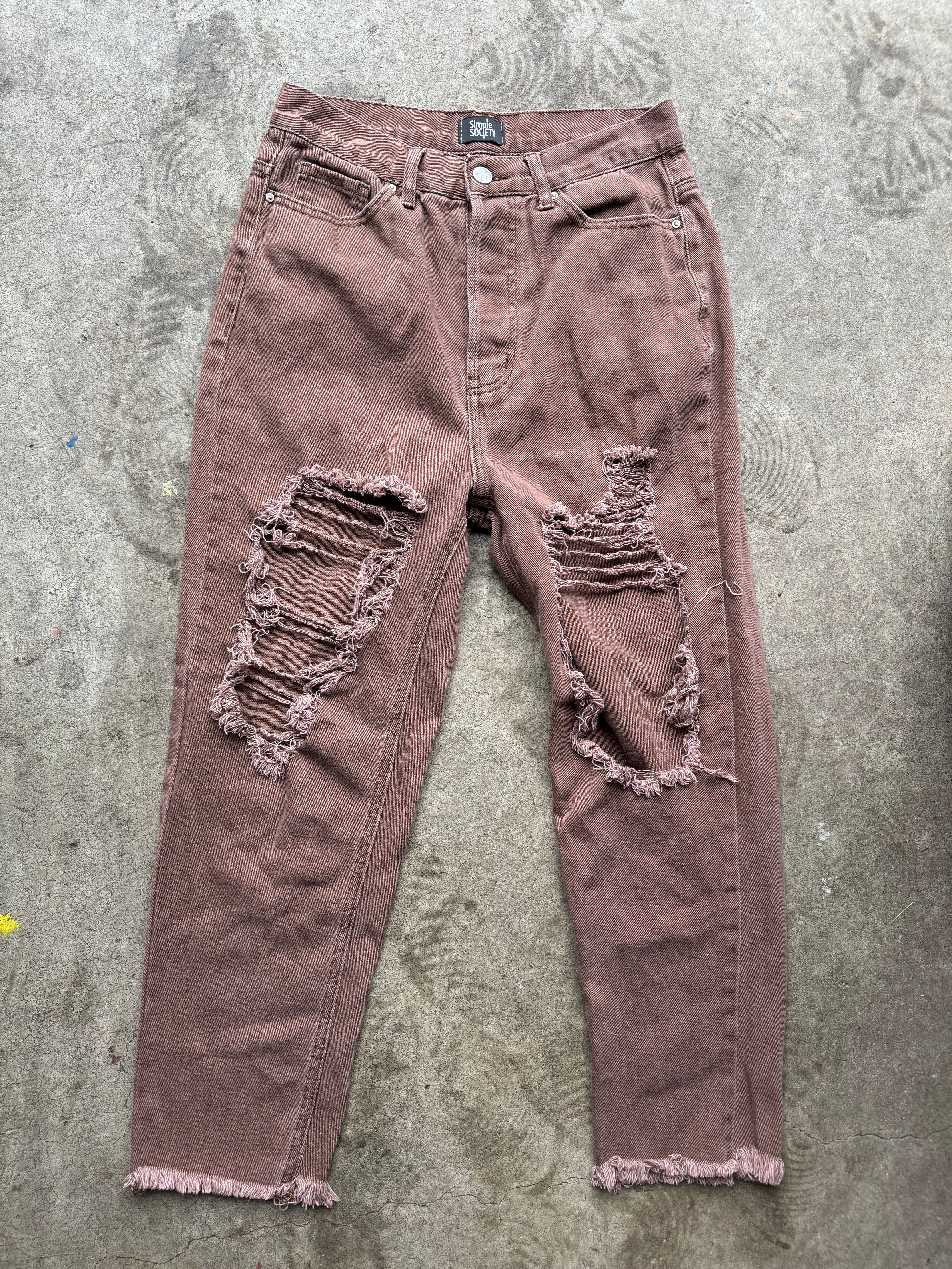 Brown ripped jeans store